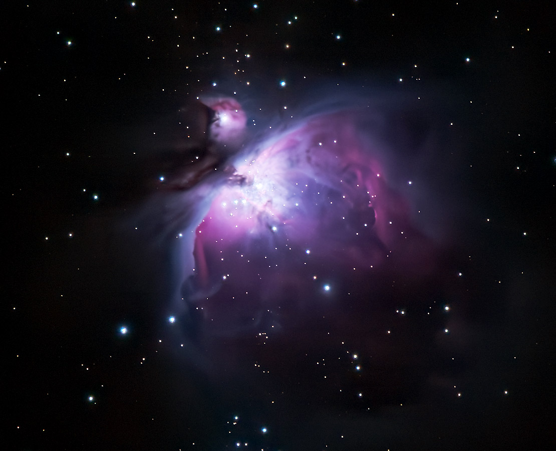 
La belle nébuleuse d'Orion aussi appelée M42 et le trapèze d'Orion (les quatre étoiles au centre de la nébuleuse)